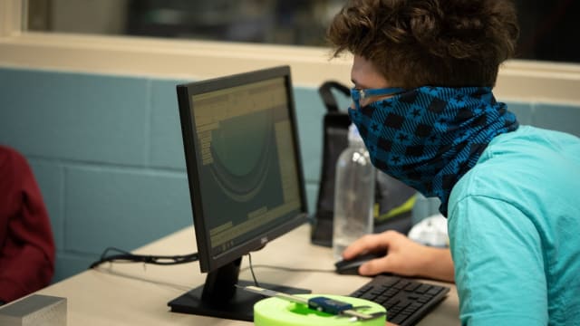 Landon designs a part using Fusion 360. (Image courtesy of Davis Tech.)