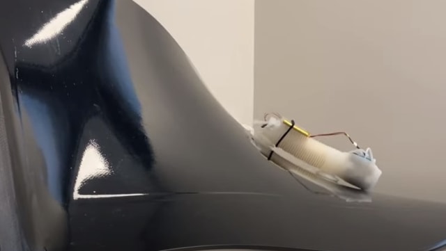 This video screen capture shows GE’s Sensiworm navigating a curved surface. Image: GE Research/YouTube