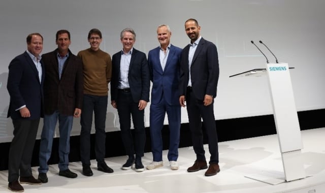 From left, Douglas Snyder, chairman of the board of Volta Trucks, Alan White, head of Emerging Platforms at Smart Infrastructure, Thomas Kiessling, chief technology officer at Siemens Smart Infrastructure, Peter Körte, chief technology officer of Siemens AG, Carl-Magnus Norden, founder of Volta Trucks, and Essa Al-Saleh, CEO of Volta Trucks at Siemens Digital Business Media Day in Berlin.