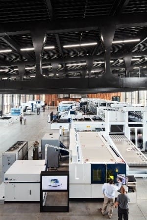 The production hall, 180 feet in length, showcases a sheet metal manufacturing line, with a high storage bay that supplies materials to the machine tools connected to it. (Image courtesy of Trumpf.)
