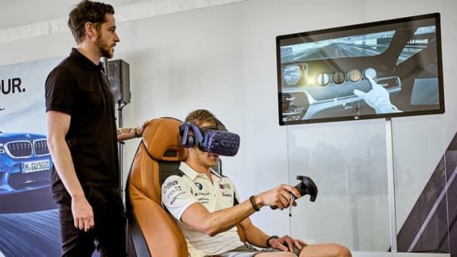 Customers taking the BMW M Virtual Experience could load their preconfigured feature sets and change different aspects of the interior, paint and wheels during the visualization. By sitting in a real M5 car seat mapped into their virtual world, each person could open the passenger door and get inside the 1:1 scaled virtual model. After interacting with the gear shift, rear-view mirror, steering wheel and cabin storage compartments, a start button magically appeared to start the engine and begin the virtual car’s motion down the racetrack’s starting lights. They turned green and the race began, giving users a virtual ride down a famous track, like Le Mans in France. (Image courtesy of HTC Vive.)