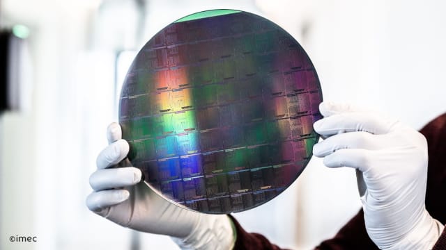 Silicon nitride wafers with photonic integrated circuits are manufactured on imec’s 200mm line. (Image courtesy of Imec.)