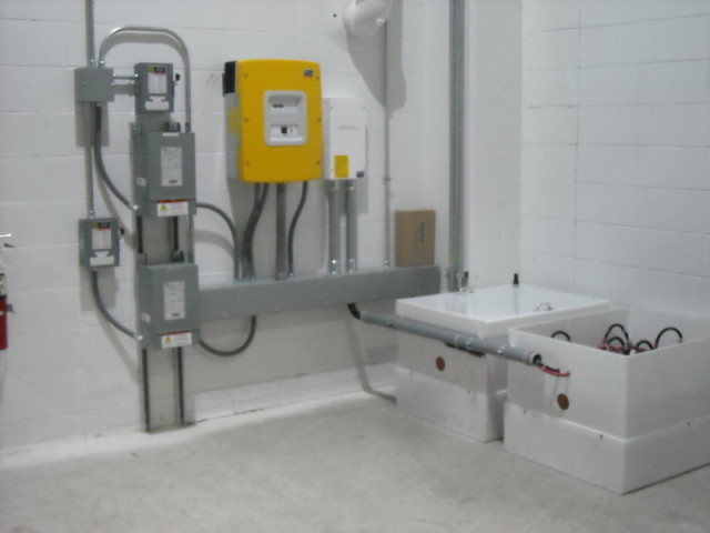 Battery Bank (2 boxes on the right) with Smart Inverter (yellow box)