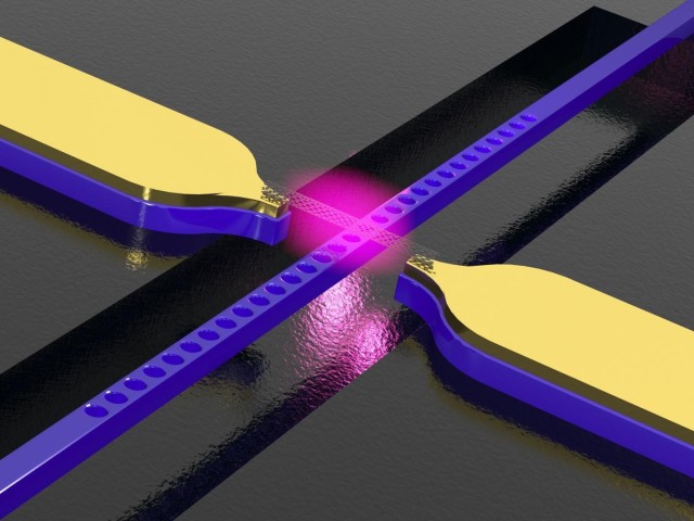 Carbon nanotube above a photonic crystal waveguide with electrodes. The structure converts electric signals into light.