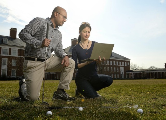 Rajat Mittal, left, and Neda Yaghoobian using the computer simulation developed. (Image courtesy of Will Kirk/Johns Hopkins University.)
