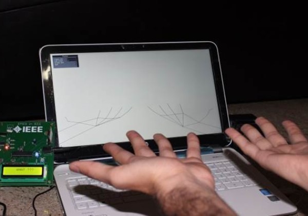 This student-designed device takes input from the motion controller and cameras to translate sign language into English. (Image courtesy of IEEE.)