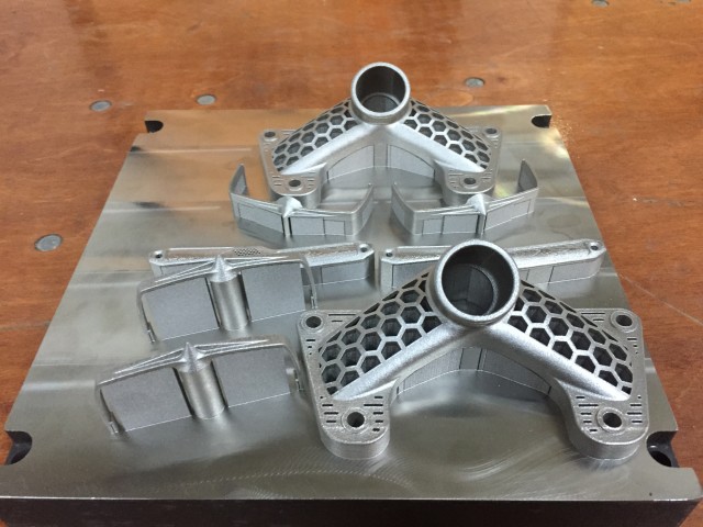 Metal AM parts are created with an extra 6mm of metal that must be removed from the build plates