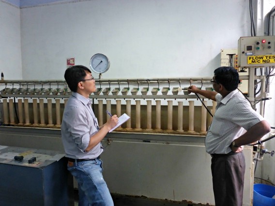 Ruo-Qian Wang (left) worked with engineers at Jain Irrigation Systems in Jalgaon, India, to understand the design requirements for high-efficiency irrigation technology. (Image courtesy of MIT.)