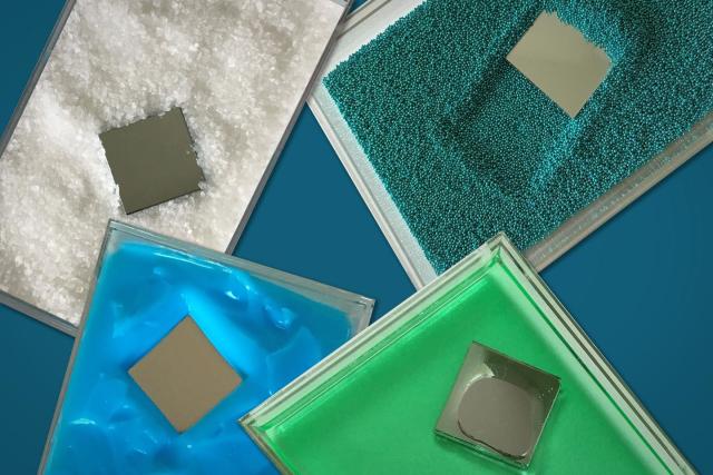 The photograph shows a square-shaped 'intruder' plunging through various material, including coarse, salt-like grains (white) and fine sand (blueish green), as well as more viscous (green) and pasty (blue) materials. (Image courtesy of Felice Frankel.)