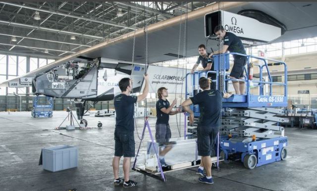 Technicians Replace the Batteries