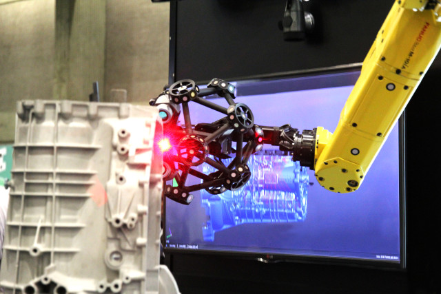 Metrology automation - Automated part inspection by a robot-mounted optical CMM.