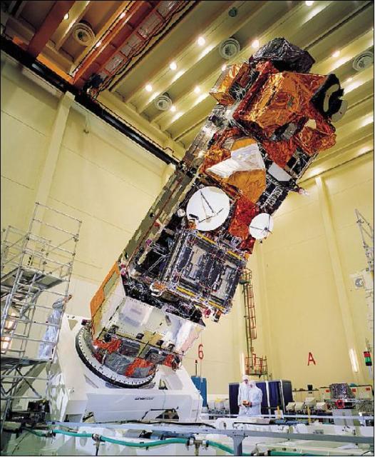 Envisat during construction. Note the workers below, for scale (Image courtesy of ESA.)