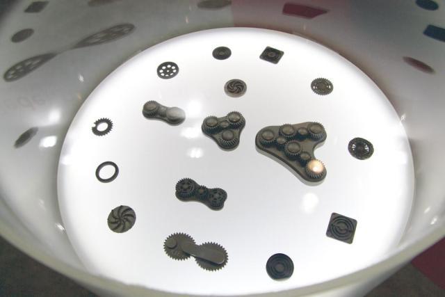 Stainless-steel and silver 3D-printed parts produced by the XJet platform. (Image courtesy of the author.)