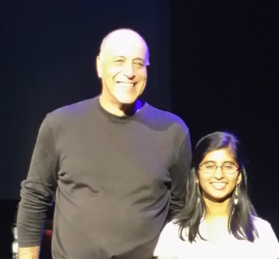 Sixteen-year-old roboticist Anna Nixon shares the stage with Autodesk CEO Carl Bass at Autodesk University 2016. (Image courtesy of @carlbass.)