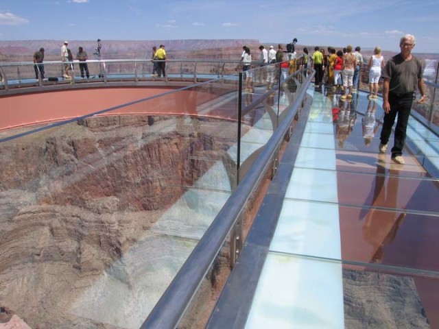Tourists stroll on the SkyWalk, 4000 ftabove the bottom of the Grand Canyon. (Image courtesy of the Grand Canyon National Park.)