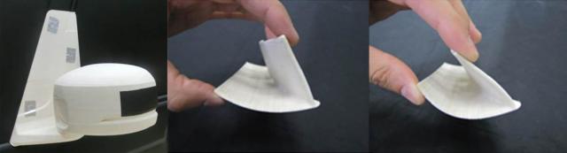 On the left, a full-scale wing mirror prototype for wind tunnel testing, determined to cost 65 percent cheaper than plastic prototypes. On the right, a wind tunnel test part of an aerodynamic racecar body spoiler for GT Aero. (Image courtesy of Mcor.)