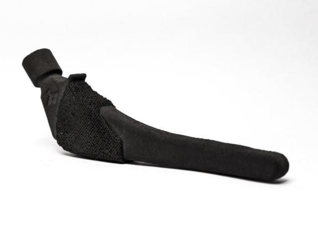 A 3D-printed femoral stem implant made with carbon fiber and PEEK. (Image courtesy of Impossible Objects.)