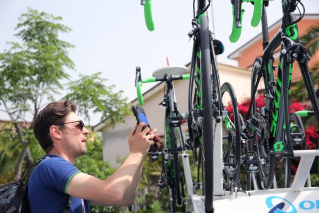 Figure 6- An official scans team bikes for hidden motors at the Giro d'Italia last month. Photo: Tim De Waele | TDWsport.com