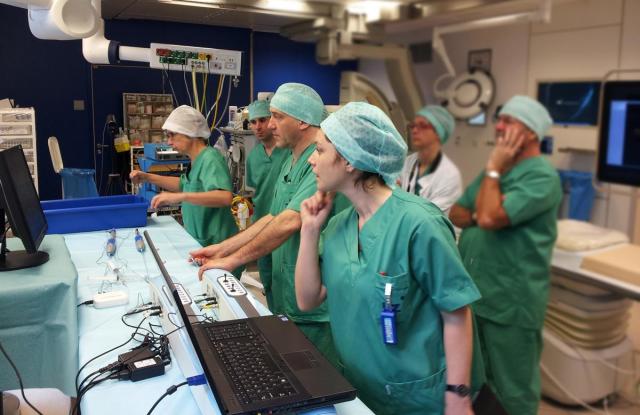 Medical professionals using the Simbionix angiogram simulator. (Image courtesy of 3D Systems.)