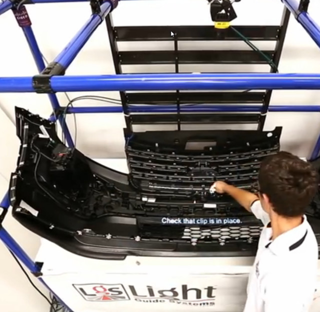 Put this part here: It couldn't be easier with this augmented reality application from OPS Solutions. (Image from Light Guide Systems video.)
