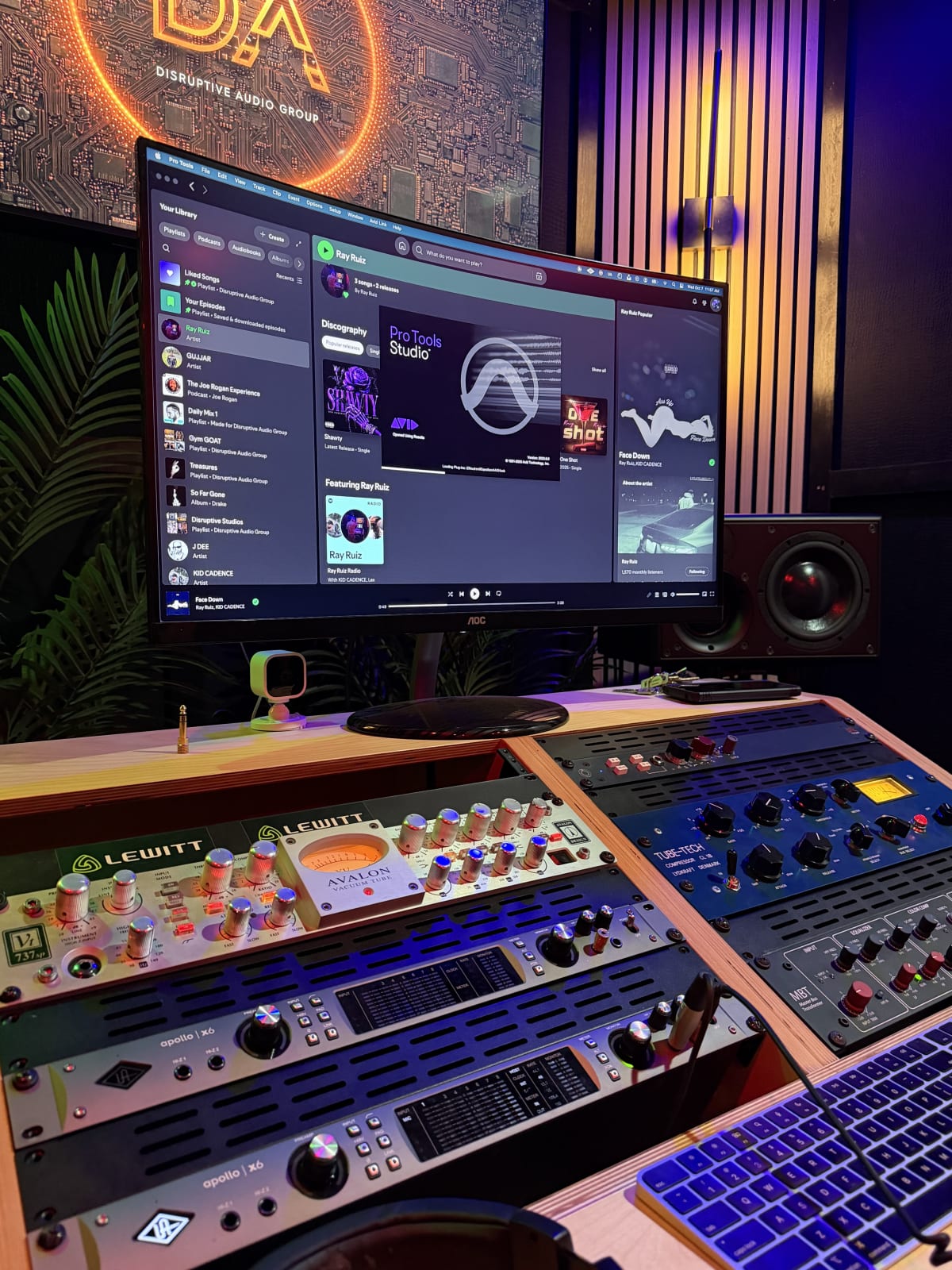 Pro Tools on the monitor above the outboard rack and Apollo interfaces