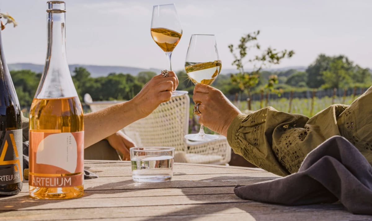 Artelium bottles being enjoyed