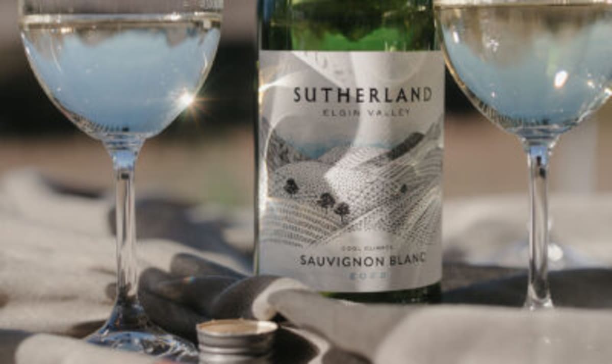 Bottle of Sutherland wine with two glasses