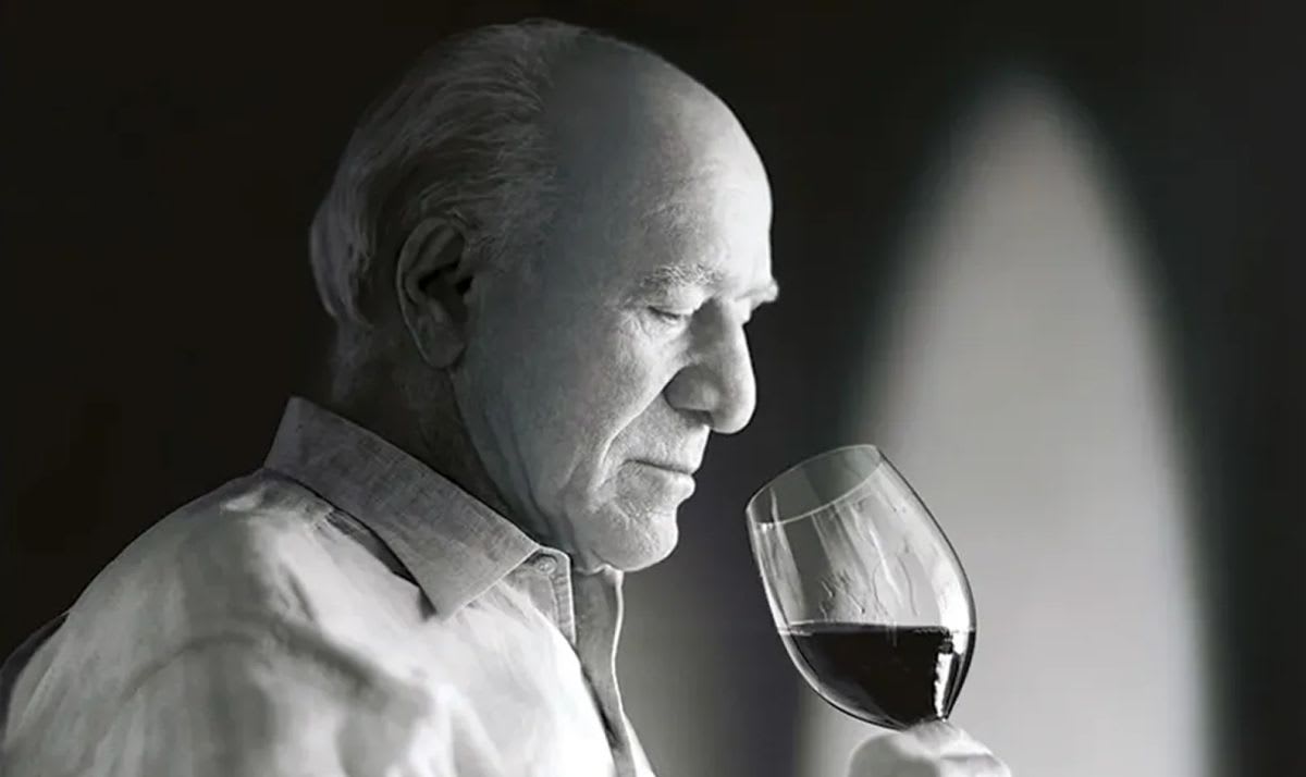 Robert Mondavi with a glass of wine