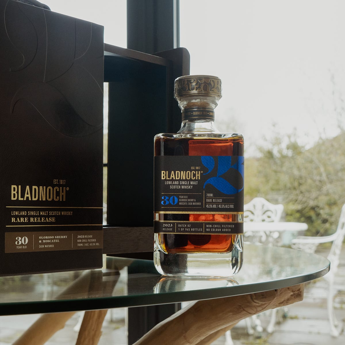 A photo of Bladnoch 30 year old with its gift box on a table