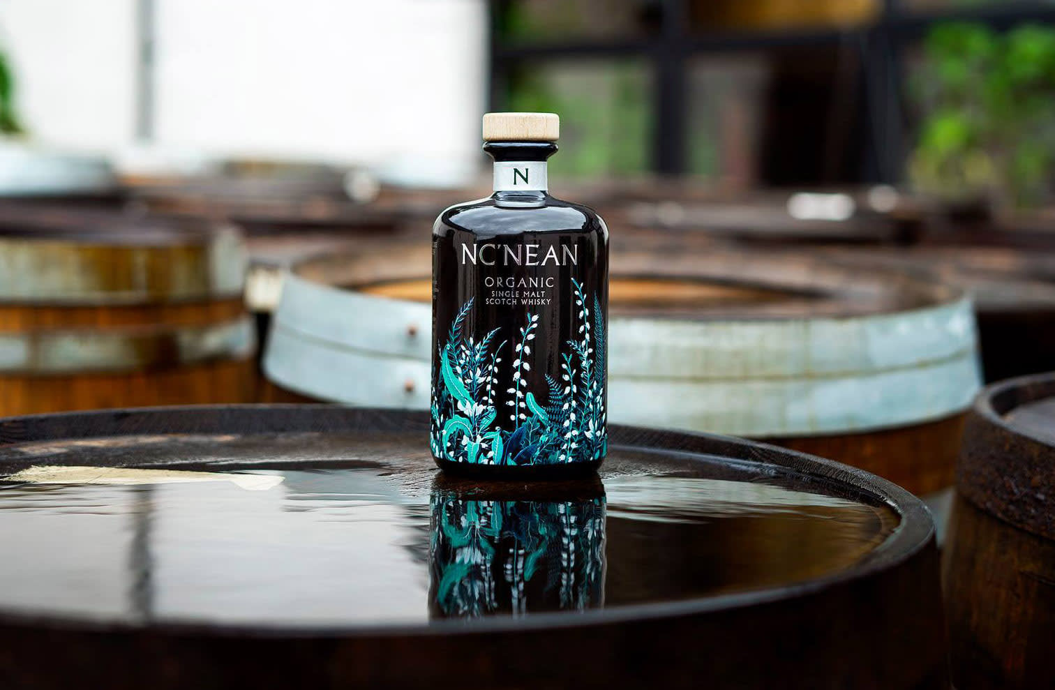 Nc'Nean Organic Whisky on a barrel Nc'Nean Organic Whisky on a barrel