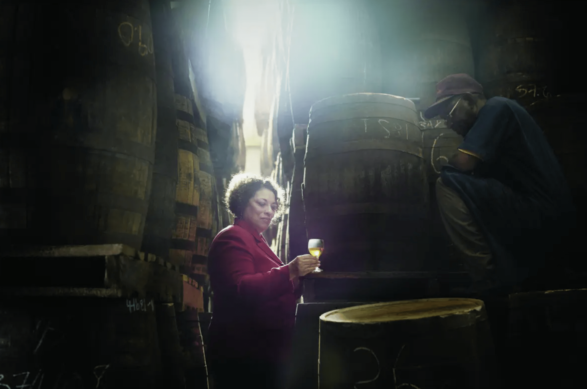 Joy Spence sampling rum in the warehouse Joy Spence sampling rum in the warehouse