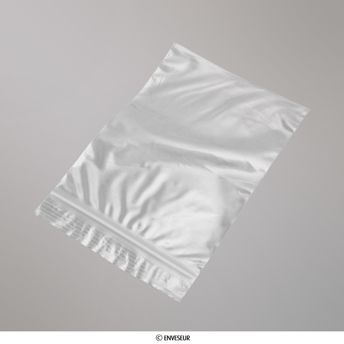 Sachet blister fermeture zip blanc et transparent de grande taille.