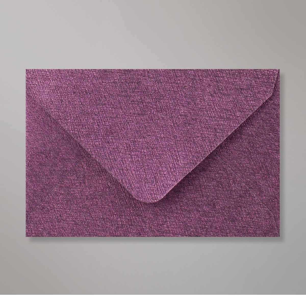 Enveloppe à grains amarante 62x94 mm
