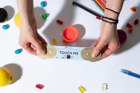 Create a circuit between the device and human body or the fruit, to explore environments through interactive musical experiences