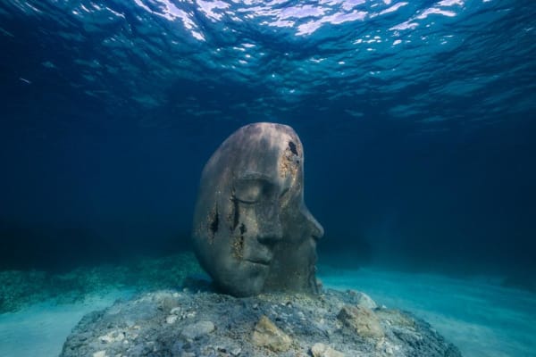 Gallery of sculptures under the Mediterranean Sea, depicting citizens of its sea banks, decrying ongoing human destruction of its ecosystem