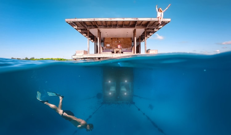 Enter an alternate reality submerged in the Indian Ocean at private traditional Swahili island surrounded by coral