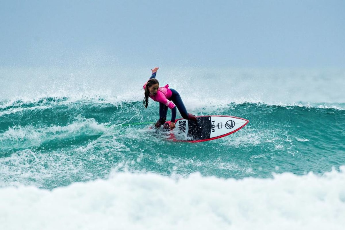 Tash Gouldsbury surfing