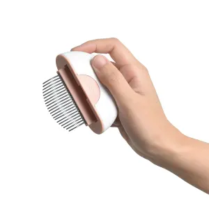 Hand holding one side of the comb