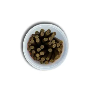 Probono Chicken Rollies Dog Chews inside packaging with brown tube treats