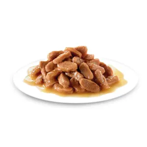 Royal Canin Kitten Sterilised Wet Cat Food - Gravy on plate with brown meaty bits and gravy