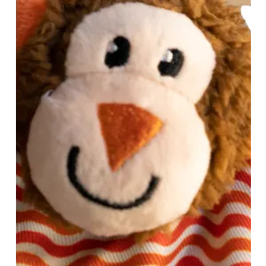 Little Nippers Cheeky Chimp Dog Toy close up of face with black and orange accents