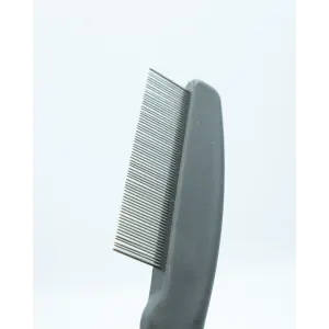 Flea Comb For Pets close up of silver metal teeth to assist with flea removal
