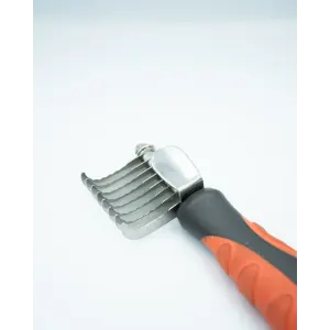 Dematting Comb For Dogs and Cats close up of metal teeth