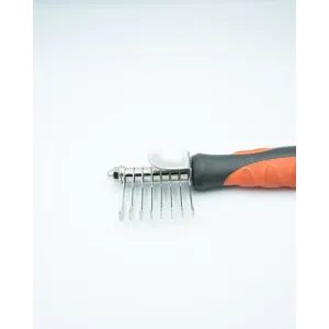 Dematting Comb For Dogs and Cats side view metal teeth with black and red handle