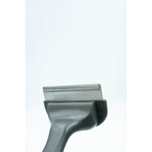 Dog Moult Stoppa Deshedding Tool close up of the steel teeth