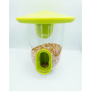 Singing Friend Multi-Feeder For Birds green color with seeds inside