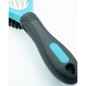 Double Sided Pin Brush For Dogs close up of black handle with blue accents