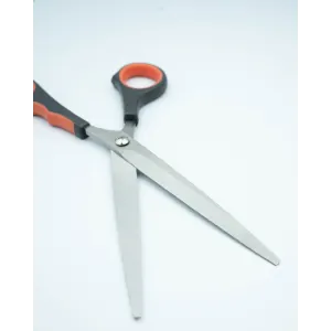 Grooming Scissors For Dogs opened with blades spread apart, black and red handle