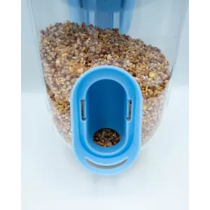 Singing Friend Seed Feeder For Birds blue color with seeds, close up of opening