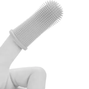 Pet Dent Finger Mittens (2 Pack) placed onto finger